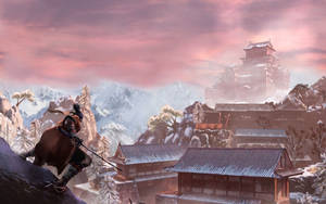 武士戰士在黃昏時分攀爬日本村莊上方的雪崖。