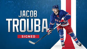 冰球運動員 Jacob Trouba 身穿 Rangers 球衣，手持球棍，帶有「Signed」文字。 — 冰球 壁紙