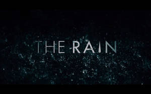 「THE RAIN」呢個詞以發光字母顯示喺黑暗嘅雨景背景上。