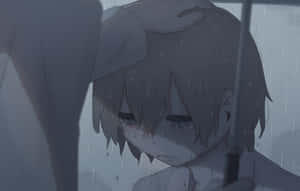 悲傷的動漫男孩在雨中撐傘哭泣