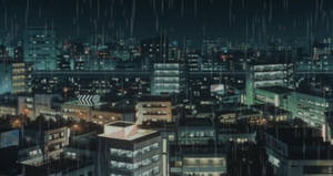 夜雨落在一個密集的城市，有發光的窗戶和濕漉漉的街道。 — 東京 壁紙