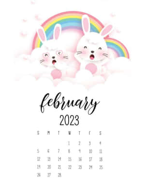 2023 年 2 月日曆，雲上彩虹下有兩隻卡通小兔。