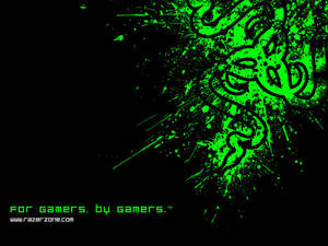 螢光綠色 Razer 標誌，帶有飛濺設計和遊戲口號，背景為黑色。