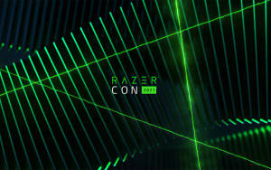 綠色激光網格圖案，中央有 Razer Con 2021 文字。