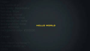 數位螢幕顯示黃色文字 'hello world'，背景為 CSS 程式碼。 — 黑屏 壁紙