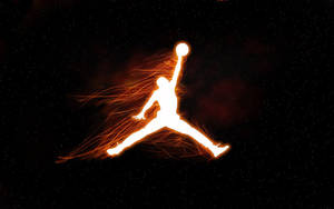 一個發光的籃球運動員帶著熾熱的軌跡跳躍穿過太空。 — Air Jordan GIF 壁紙