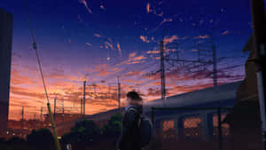 背著背包的動漫女孩站在星空和鐵路線下的暮色天空下