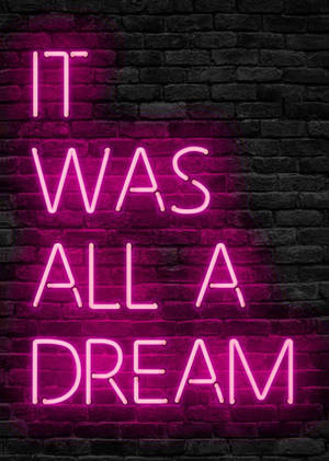 粉紅色霓虹燈牌寫著「It was all a dream」，位於深色磚牆上。 — Oppo Pad 5 霧面螢幕 壁紙