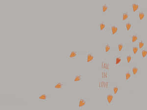 橙色心形圍繞灰色背景上的 fall in love 字樣飄浮。