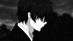 動漫男孩在雨中低頭流淚