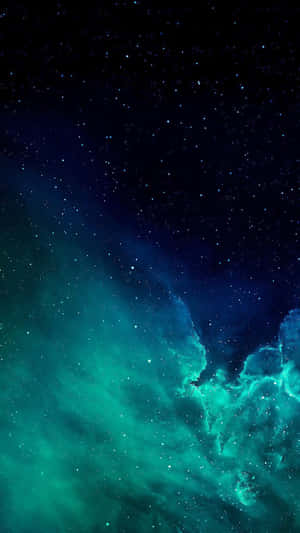 在星空下閃耀的鮮豔青綠色和藍色星雲。 — 銀河 壁紙
