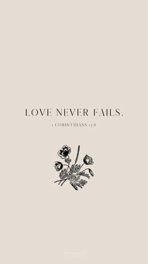 米色背景上文字「LOVE NEVER FAILS」下方有花卉設計。
