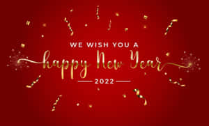 2022年新年快樂祝福，紅色背景上帶有金色紙屑和閃光。