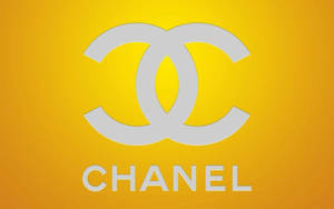 黃色漸變背景上的白色Chanel標誌 — 凌志標誌 GIF 壁紙
