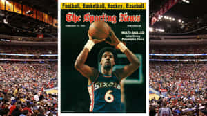 朱利葉斯·歐文身穿76人球衣在《Sporting News》封面投籃，背景有體育館人群。 — 籃球 壁紙