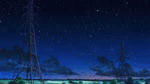 在閃爍的田野上空，繁星點點的夜空下的電塔。
