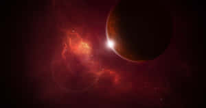 深空中的紅色星雲和黑暗行星，以及一顆明亮的恆星。 — 外太空 壁紙