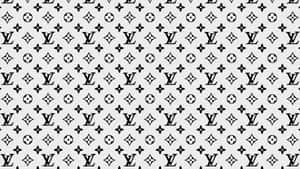 淺灰色背景上的黑白Louis Vuitton字母組合圖案。