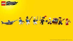 黃色背景上的LEGO Pirates人仔和鯊魚。