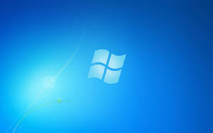 Windows 標誌帶有燈光條紋和綠色嫩芽，背景為藍色漸變