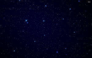 繁星點點的夜空，在深藍色背景上閃爍著星星。