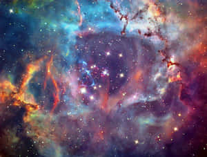 色彩繽紛的星雲，充滿了發光的恆星和深空中的宇宙雲團。 — 銀河系 壁紙