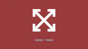 白色四箭標誌在勃艮第背景上，帶有文字 seeing things