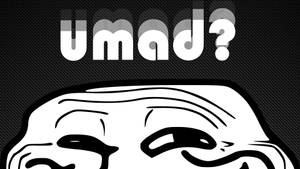 一個風格化的咧嘴笑表情，帶有文字 umad?，背景是碳纖維。