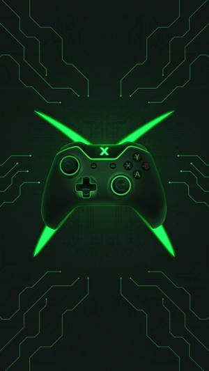 發光綠色Xbox控制器在黑暗電路板背景上