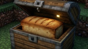 打開的Minecraft箱子，裏面有一個溫暖發光的麵包。