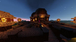 Minecraft村莊，有發光的燈籠和石屋，星空下。 — 夜景城市 壁紙