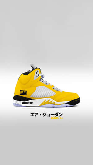 灰色背景上帶有黑色和白色細節的黃色 Air Jordan 5 Tokyo 23 運動鞋。