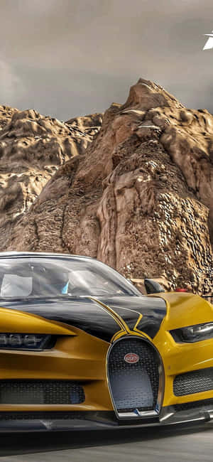 黃黑相間的Bugatti在日落時分疾馳穿過沙漠峽谷。 — Redmi Note 壁紙