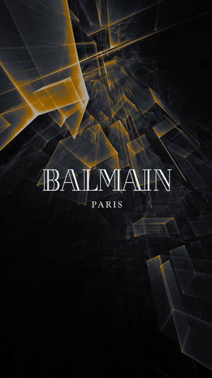 黑色背景上帶有 Balmain Paris 文字的抽象金色幾何形狀