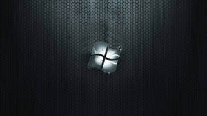 發光的Windows標誌在深色六角網格背景上