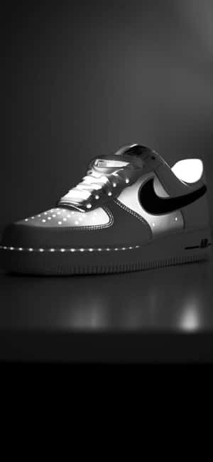 黑白工作室燈光下發光的LED Nike Air Force 1運動鞋。 — 小米18 Pro 壁紙
