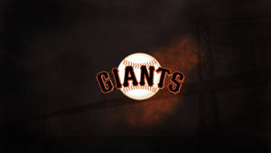 一個發光的棒球標誌，帶有「GIANTS」文字，襯托在黑暗的橋樑輪廓上。 — 棒球 壁紙