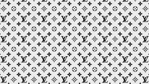 淺灰色背景上的黑白 Louis Vuitton 字母組合圖案。