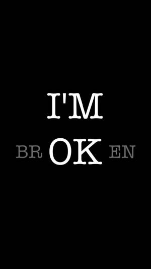 簡約黑色背景，白色文字「I'M OK」，兩側有灰色字母「BR」和「EN」。 — 黑白 壁紙