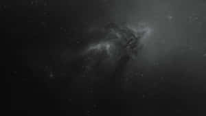 深邃太空中帶有旋轉雲霧和散落星星的黑暗宇宙星雲。