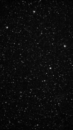 一個佈滿無數閃爍星星的星空夜空，背景是黑色虛空。