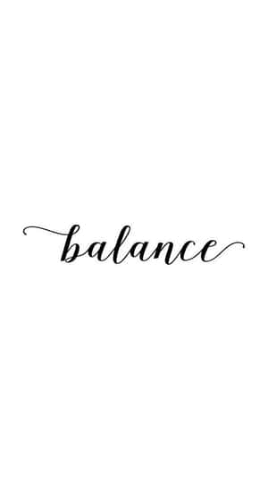 「balance」一詞以優雅的黑色草書寫在白色背景上。