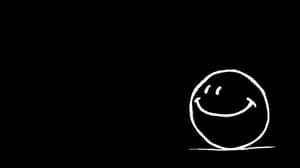 在黑色背景上繪製的極簡白色笑臉。