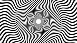 黑白波浪線向內螺旋，營造出催眠般的視錯覺。