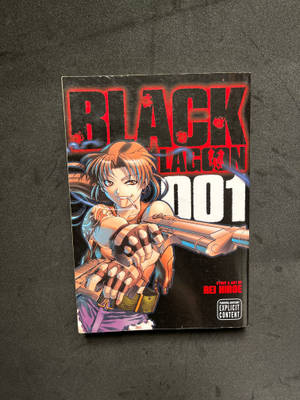 Black Lagoon Vol 1 的動漫漫畫封面，展示一名橙色頭髮的女性持槍。