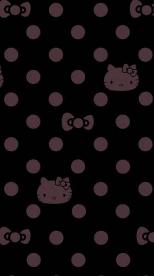 Hello Kitty 臉孔和蝴蝶結在深色圓點背景上。