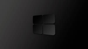 黑色Microsoft標誌，帶有漸變和陰影效果。