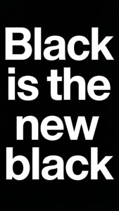 字型風格牆紙，以粗體白色字體展示「Black is the new black」這句標語。 — 平板電腦 壁紙