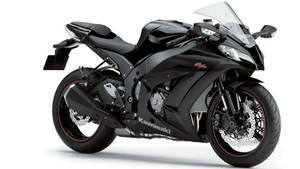 黑色 Kawasaki Ninja 運動電單車，帶有紅色飾邊和銀色煞車，置於白色背景上。