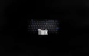 黑色手提電腦鍵盤，帶有發光白色Think標誌及紅點，背景為深色。 — 美學筆電 壁紙